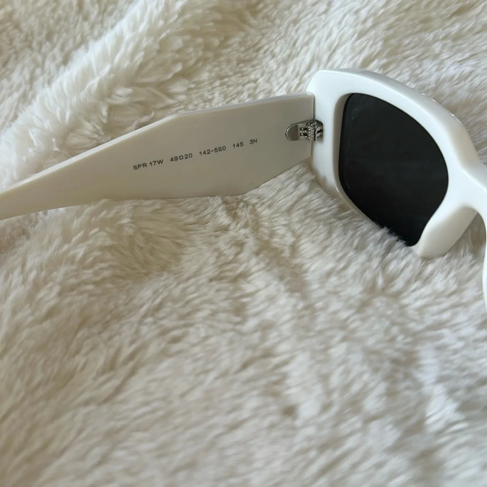 Prada White Frame Sunglasses with Dark Lenses